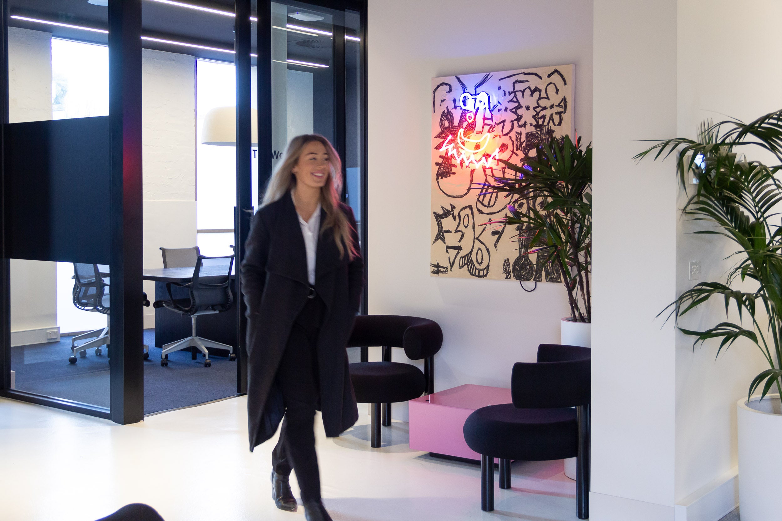 Employee striding through office